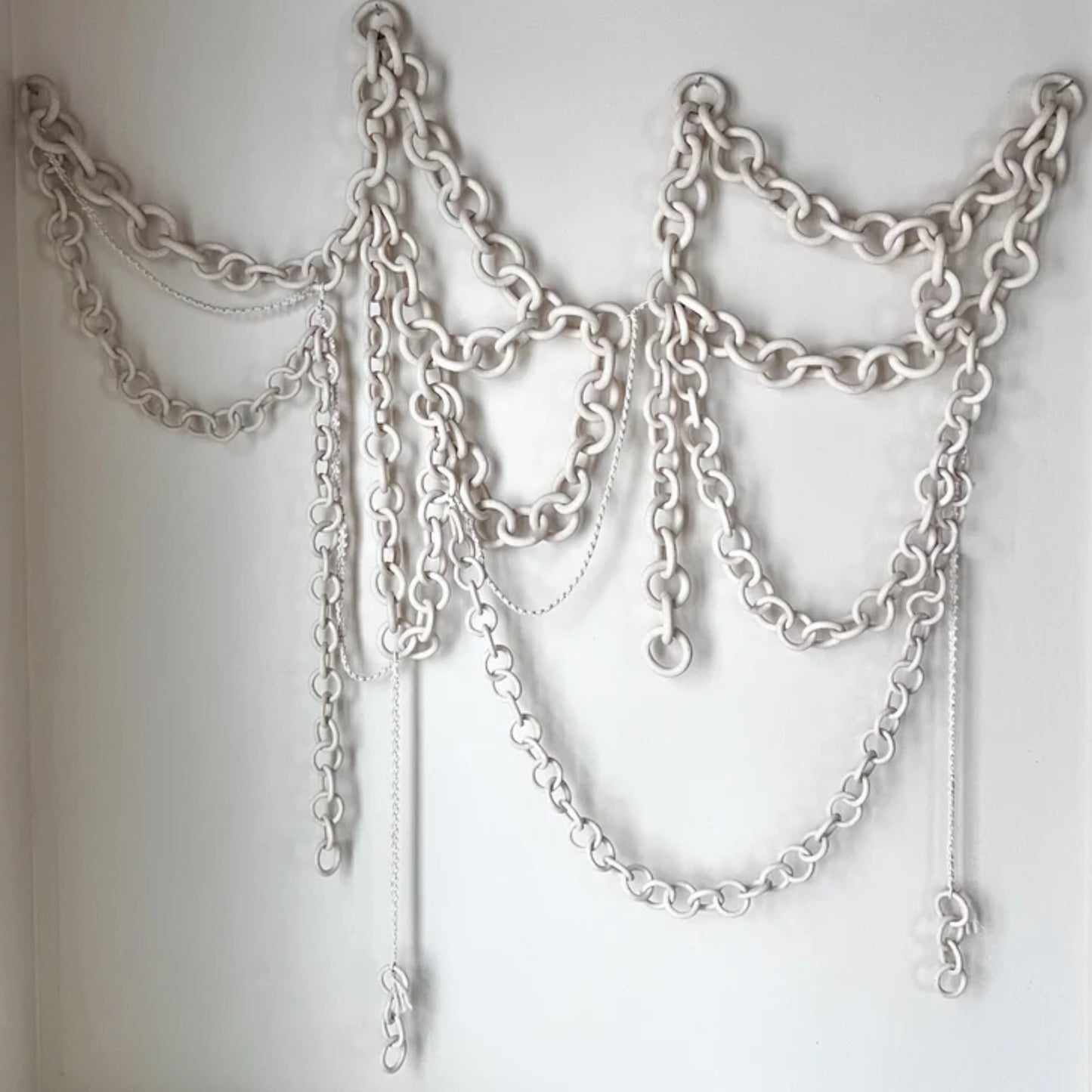 CHAINED WALL SCULPTURE