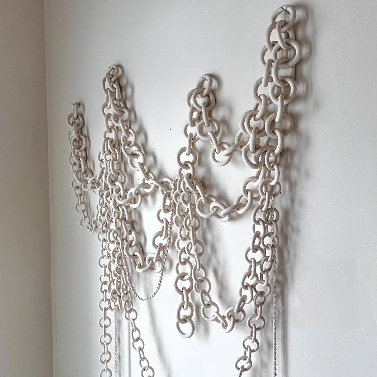 CHAINED WALL SCULPTURE